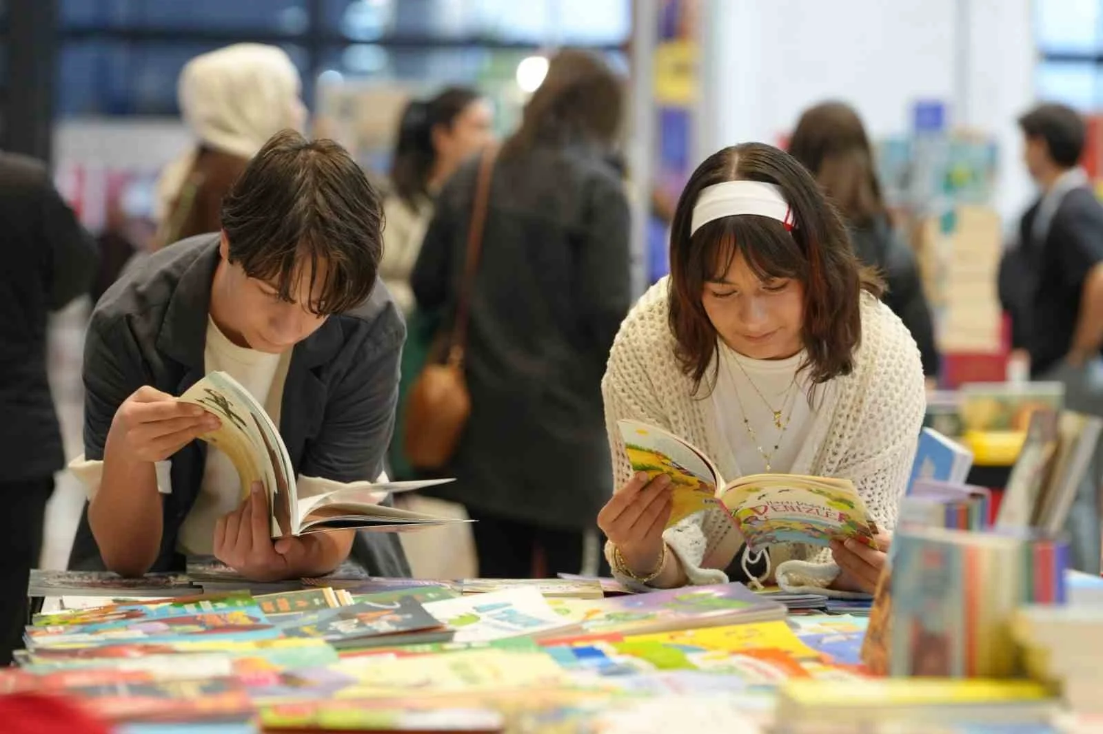 9 aylıkken geldikleri kitap fuarının 14 yıllık müdavimi oldular